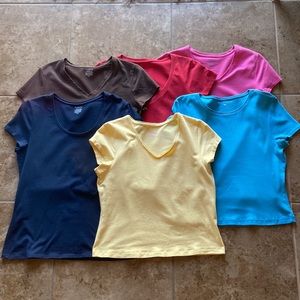 Six T-shirts of different brands all a size M